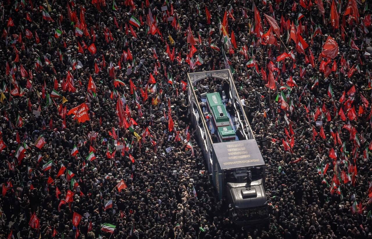 Image of the community's farewell to the martyred leader in an atmosphere of grief, respect, and the renewal of the covenant